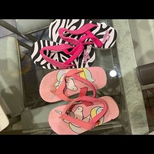 NWOT  Carter’s and Osh Gosh b’ Gosh flip flops. Size 7/8 toddler. Two pairs!
